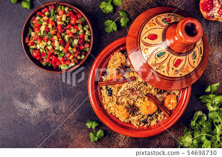Traditional moroccan tajine of chicken with dried Traditional moroccan tajine of chicken with dried 54698730