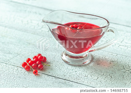 Glass boat of red currant jam Glass boat of red currant jam 54698755