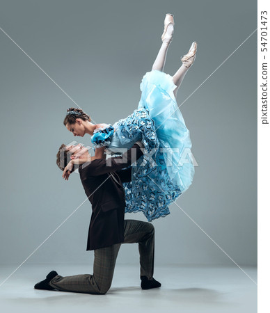 Contemporary ballroom dancers on grey studio background Contemporary ballroom dancers on grey studio background 54701473