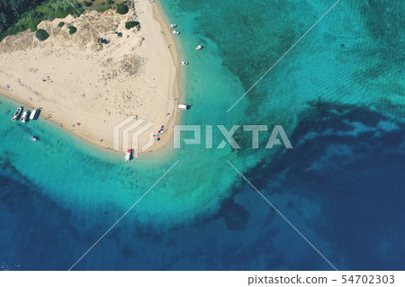 Aerial drone view of Marathonisi island Aerial drone view of Marathonisi island 54702303