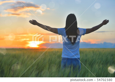 Woman feeling free in a beautiful natural setting, Woman feeling free in a beautiful natural setting, 54702380