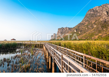 Wooden Bridge in the lake and mountain lanscape on 54702938