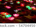 Colorful Candlelight Candles floating on the water 54704450
