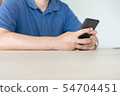 Hands using mobile smart phone  54704451