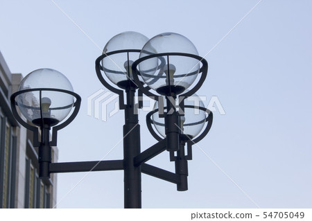 Glass lamp on black pole 54705049