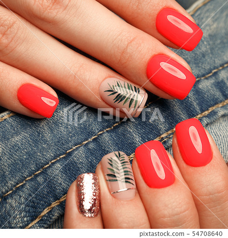 Bright neon manicure on female hands on the background of jeans. Nail design. Beauty hands. Bright neon manicure on female hands on the background of jeans. Nail design. Beauty hands. 54708640