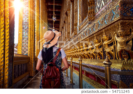 Asian lady walking and travel in Wat Phra Kaew Asian lady walking and travel in Wat Phra Kaew 54711245