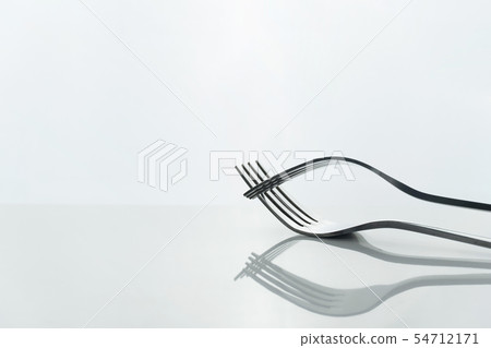 interaction of metal stainless steel two fork 54712171