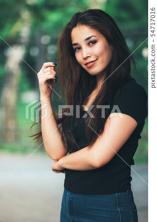 Portrait of beautiful happy long hair asian girl 54717016