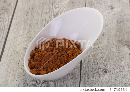Cocoa powder in the bowl Cocoa powder in the bowl 54719284