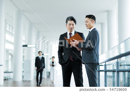 Business office business man team carrier Business office business man team carrier 54719600