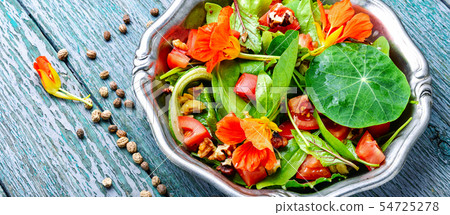 Salad with vegetables and nasturtium 54725278