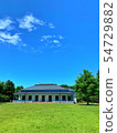 Building built in the meadow 54729882