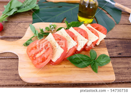 Dinner table Monstera leaf Caprese 54730738