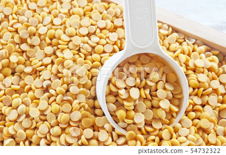 Yellow Dried Soybeans in A Measuring Spoon Yellow Dried Soybeans in A Measuring Spoon 54732322