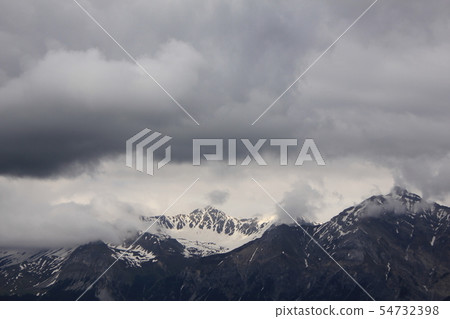 Cloudy day in the Swiss Alps. Cloudy day in the Swiss Alps. 54732398