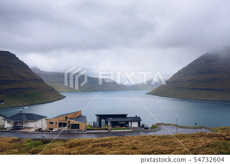Houses in Klaksvik with view over fjords and mountains in the Faroe Islands 54732604