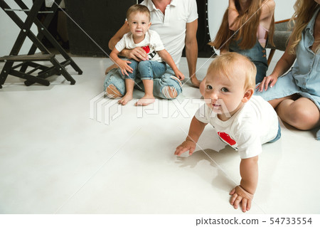 Young family spending time together and smiling 54733554