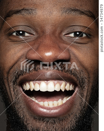 Close up portrait of young african-american man Close up portrait of young african-american man 54734979