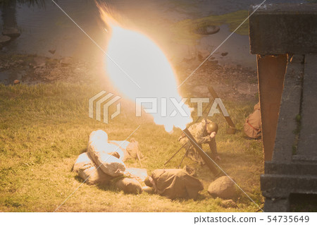 The moment of the mortar fire, on the river bank. The moment of the mortar fire, on the river bank. 54735649