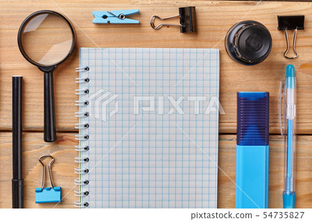 Office desk with set of colorful supplies. Office desk with set of colorful supplies. 54735827