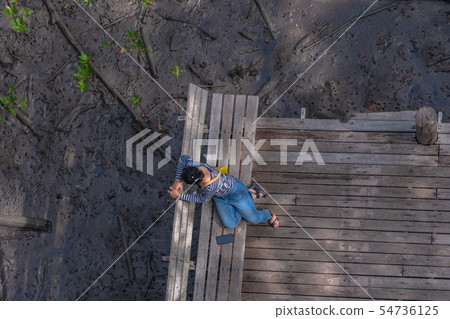 top view lady sitting on balcony 54736125