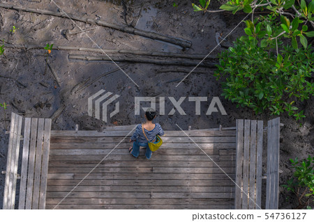 top view lady sitting on balcony 54736127