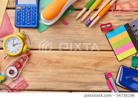 School stationery on wooden background with copy space. School stationery on wooden background with copy space. 54736196