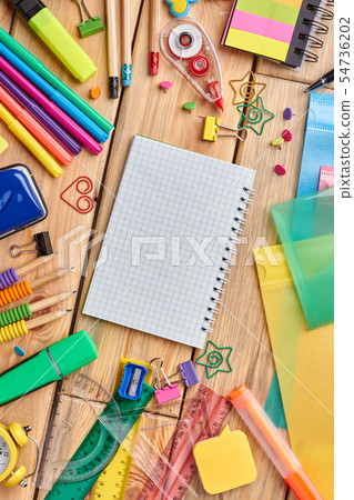 Blank notebook and colorful stationery supplies. Blank notebook and colorful stationery supplies. 54736202