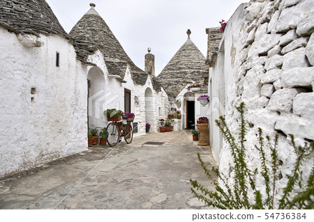 Old trulli houses in Alberobello town in Italy Old trulli houses in Alberobello town in Italy 54736384
