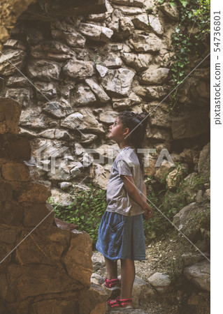 Child girl in ruins in the old town Bar Child girl in ruins in the old town Bar 54736801