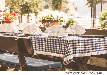 Serving at a European restaurant on street 54736866