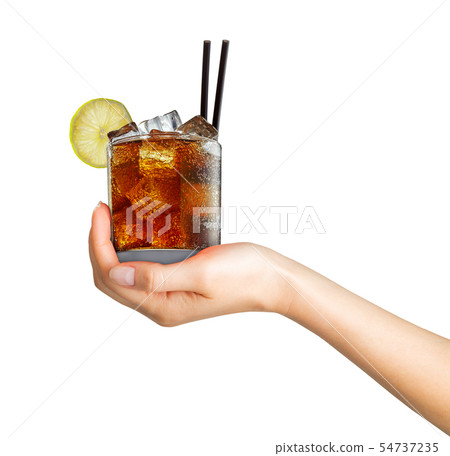 Woman hand holding cocktail in old fashioned glass with black straw Woman hand holding cocktail in old fashioned glass with black straw 54737235