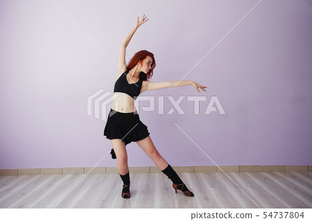Beautiful and young girl in a gym 54737804