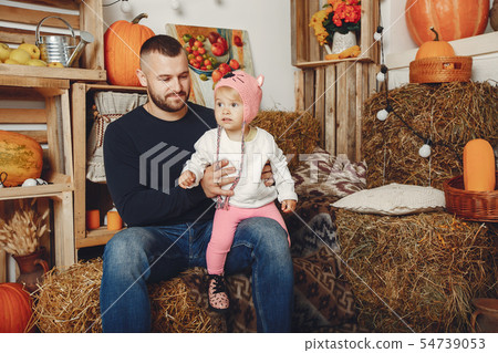 Happy father sitting with his little daughter Happy father sitting with his little daughter 54739053