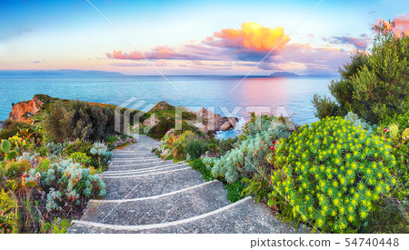 Dramatic spring sunset on the the cape Milazzo Dramatic spring sunset on the the cape Milazzo 54740448