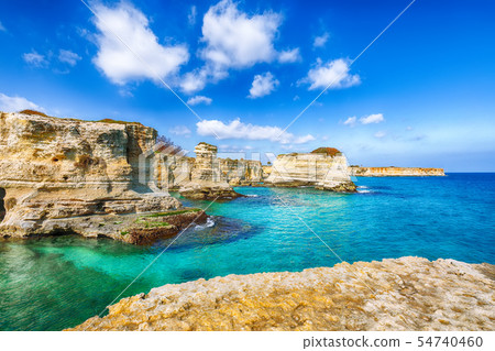 Picturesque seascape with cliffs, rocky arch at 54740460