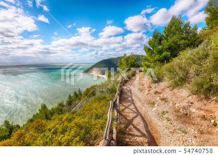Picturesque islets Faraglioni di Puglia in summer Picturesque islets Faraglioni di Puglia in summer 54740758