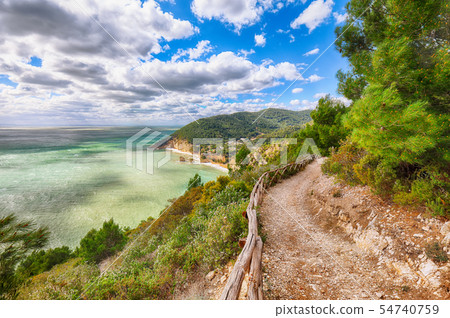 Picturesque islets Faraglioni di Puglia in summer Picturesque islets Faraglioni di Puglia in summer 54740759