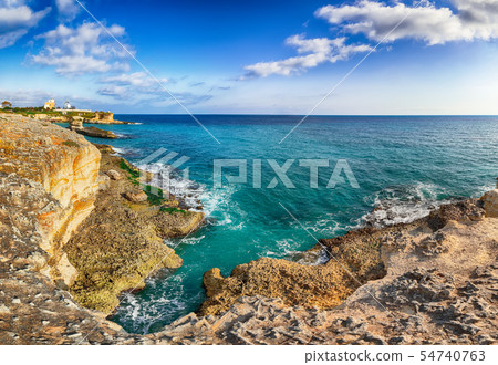 Beach Torre Sant'Andrea and islet Scoglio the Beach Torre Sant'Andrea and islet Scoglio the 54740763