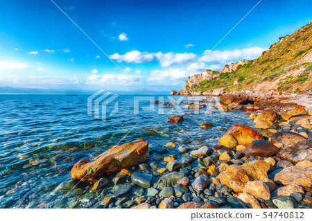 Dramatic spring sunset on the the cape Milazzo Dramatic spring sunset on the the cape Milazzo 54740812