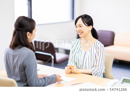 Young woman (consulting) Young woman (consulting) 54741266