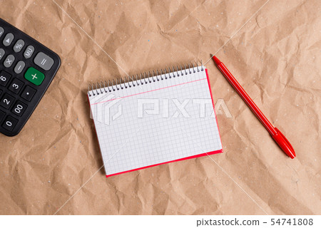 Desk made of crumpled craft paper with an open Desk made of crumpled craft paper with an open 54741808