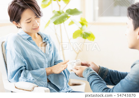 Woman refusing a present 54743870