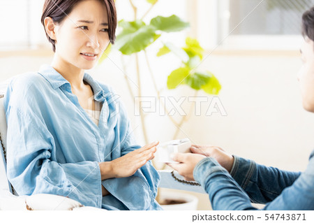 Woman refusing a present 54743871