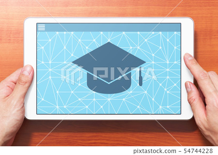 Image of e-learning. Hand up with white tablet PC. Learning app displayed on the screen. 54744228