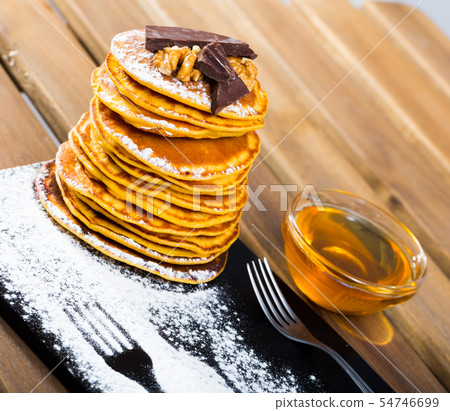 Pancakes with honey and chocolate Pancakes with honey and chocolate 54746699