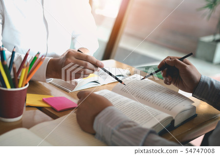 Asian young university students studying together Asian young university students studying together 54747008