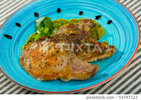 Grilled pork loin with guacamole Grilled pork loin with guacamole 54747122