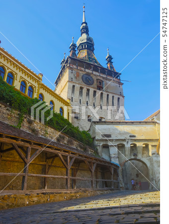 Clock tower from fortress square in Sighisoara, Romania 54747125